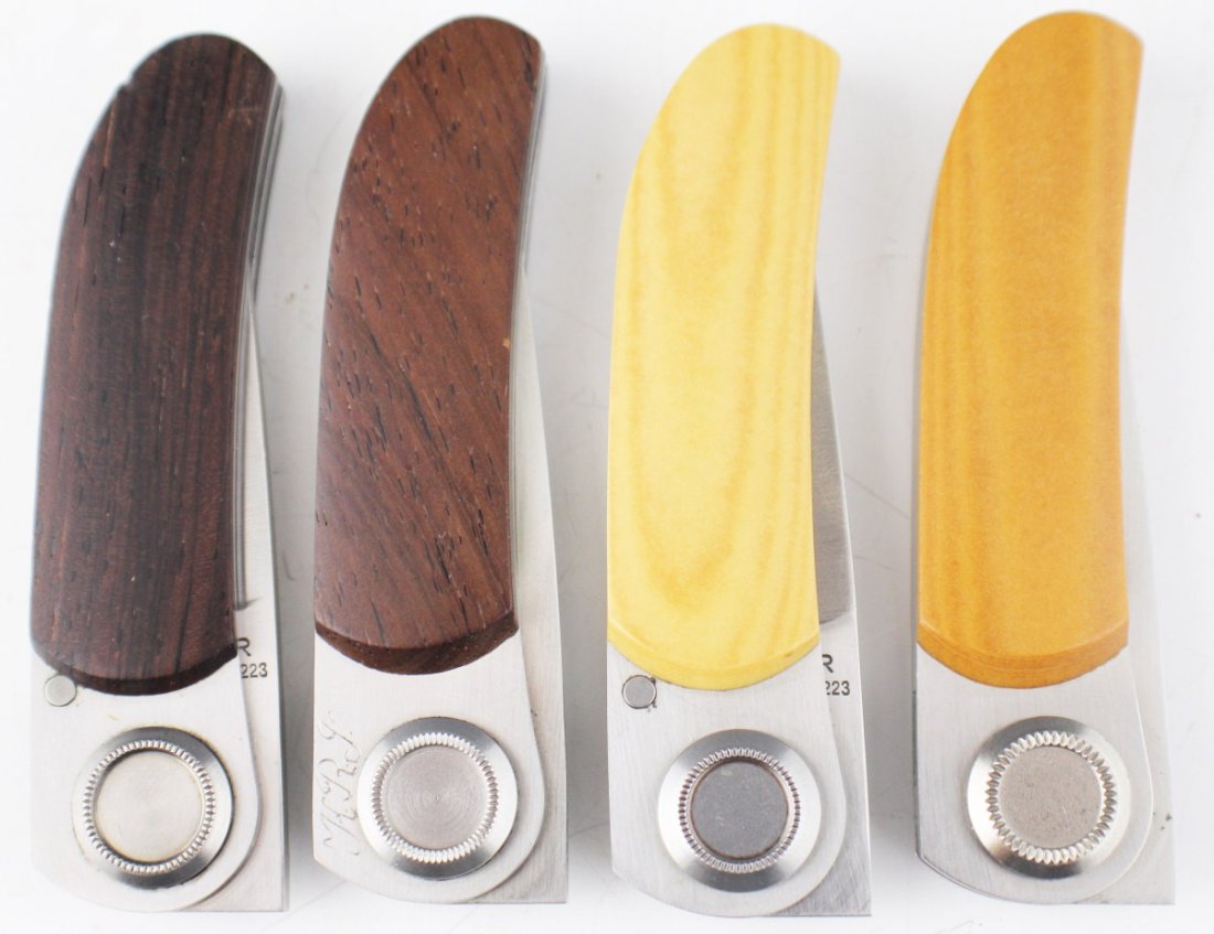 LOT OF 4 GERBER PAUL MICARTA 2PM KNIVES: LOT OF 4 GERBER PAUL MICARTA 2PM KNIVES Lot of 4 Rare Gerber Paul Micarta 2PM knives to include, 1978 Unmarked Brown Handle,scratches on blade, slight wobble. #5 1983, Brown Handle, Blade in Mint Cond