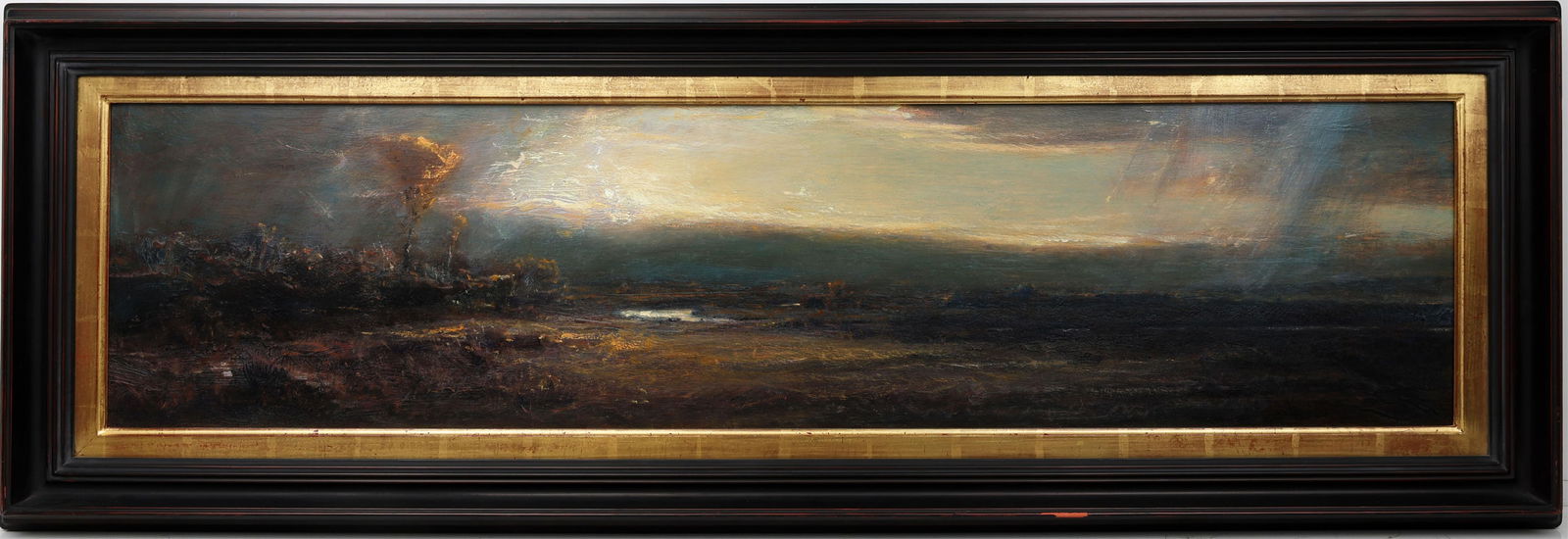 GORDON BROWN MEANDERING THROUGH: Brown, Gordon ( American, B. 1962) Painting. Oil on Masonite - signed lower right. Executed with brush. A horizontal painting depicting a detailed view of barren land with Brown's trademark rainstorm.