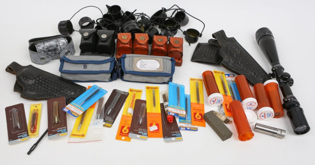 MIXED FIREARM RELATED LOT: MIXED FIREARM RELATED LOT Including: Pistol rods and brushes, scope caps, 2 leather holsters, speed loaders and leather pouches. A Simmons 6x-18x40 scope. Est. $75-150 Lot: 33181
