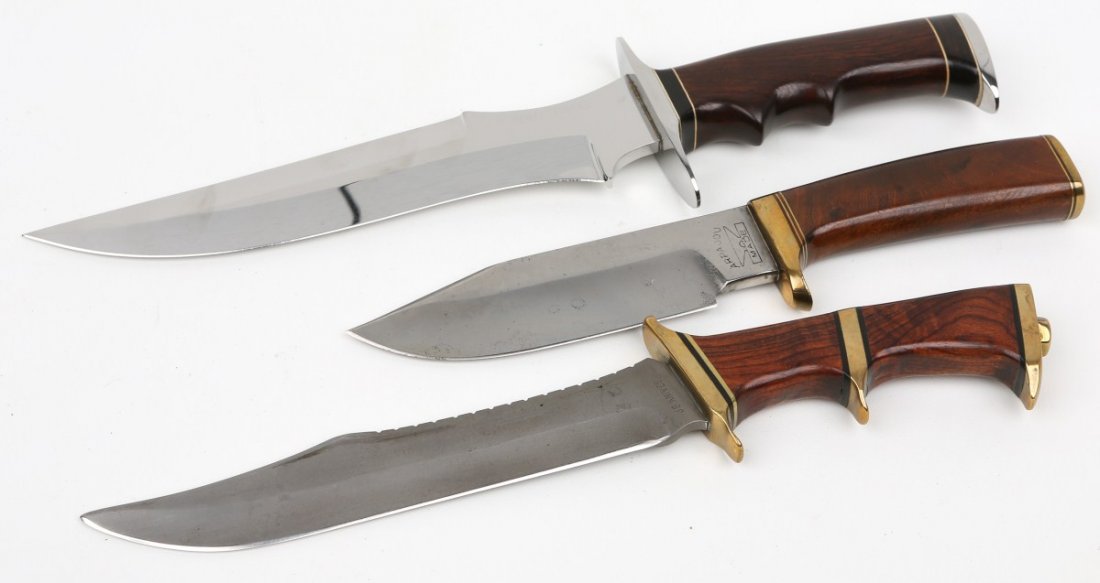 LOT OF 3 FIXED BLADE KNIVES JB KNIVES ARPAUOU: LOT OF 3 FIXED BLADE KNIVES JB KNIVES ARPAUOU Lot of 3 Fixed Blade Knives to include; Beryl Driskill wood handle, measures 14", blade measures 8.5". JB Knives Bowie Fixed Blade, measures 12.5", blade 