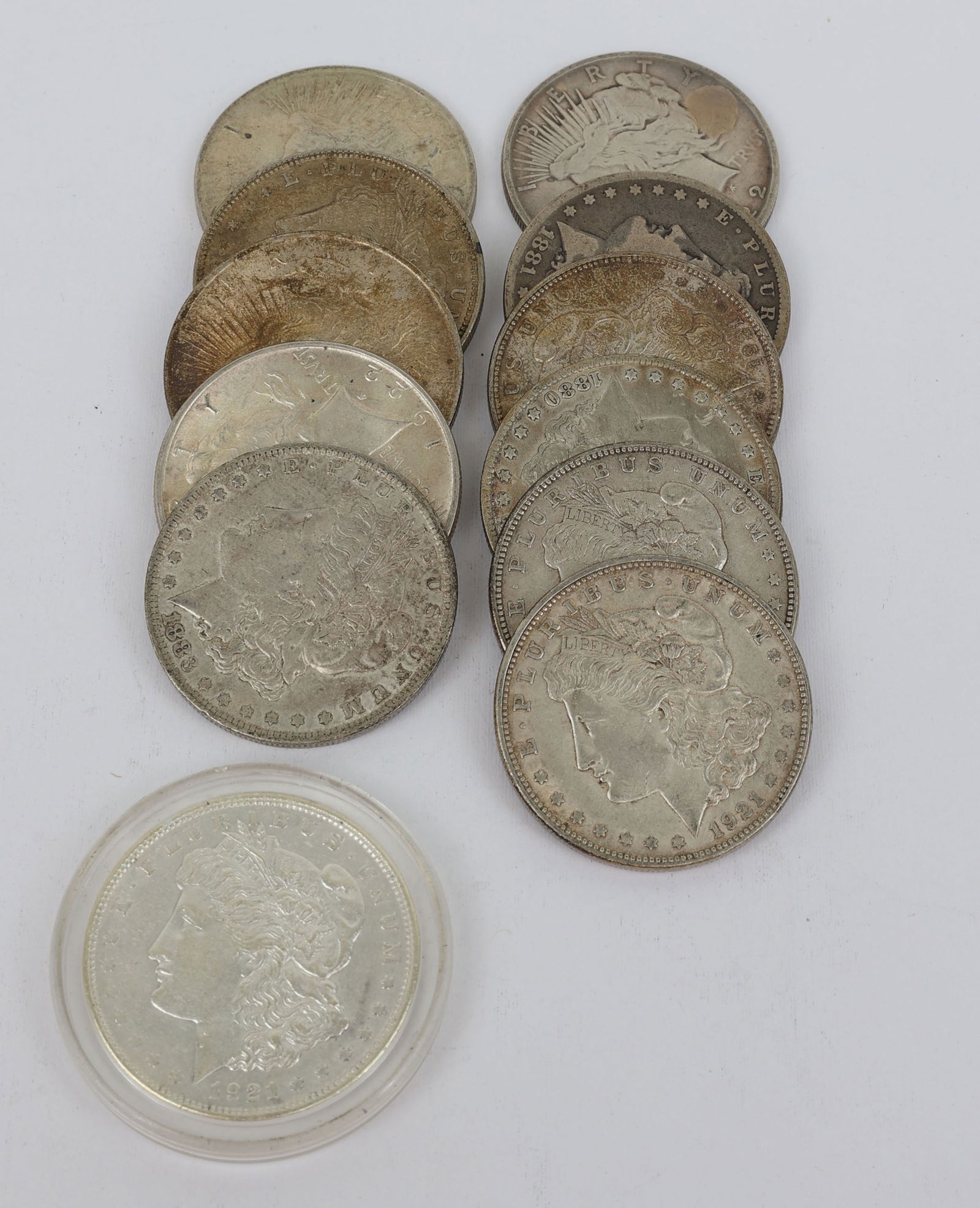TWELVE MORGAN AND PEACE SILVER DOLLARS (1 of 2)