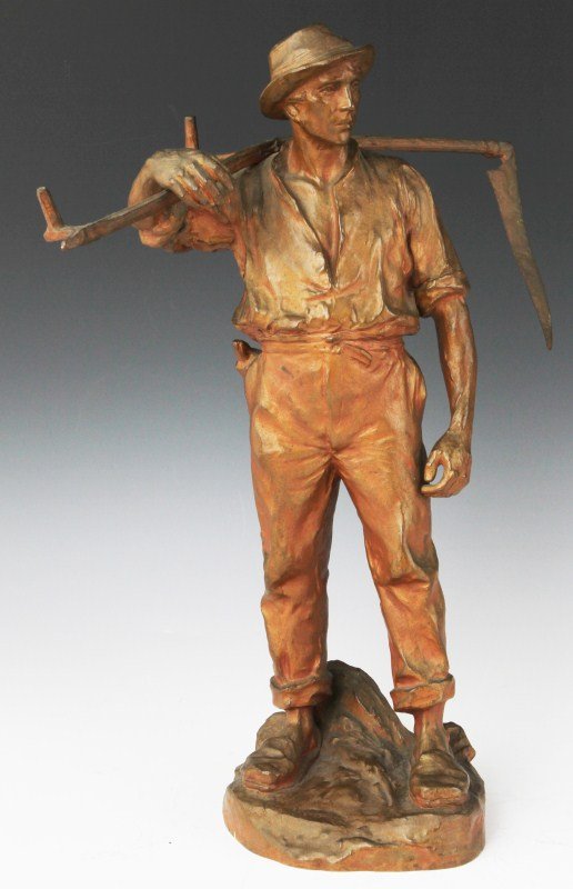 HANS MULLER AUSTRIAN BRONZE MAN WITH SCYTHE: HANS MULLER AUSTRIAN BRONZE MAN WITH SCYTHE Hans Muller (Austrian, 1873-1937). Bronze figure of a male farmer holding a scythe. Signed H. Muller. Size: 15"