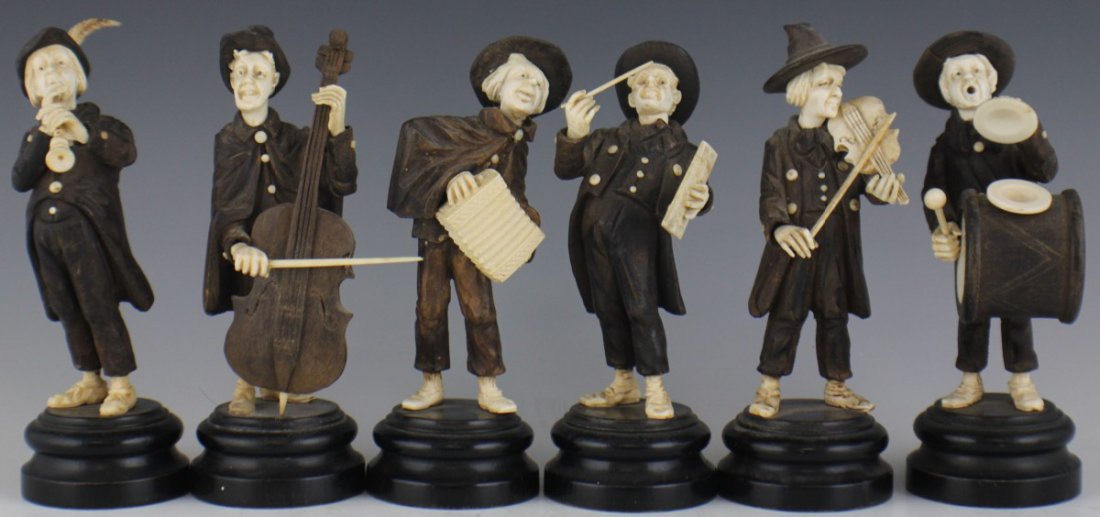 SOUTH GERMAN OR AUSTRIAN WOOD & IVORY MUSICIANS: SOUTH GERMAN OR AUSTRIAN WOOD & IVORY MUSICIANS A set of six carved ivory and wood figural musicians. Each one in a different pose and with different instruments. Each mounted to an ebonized wood base