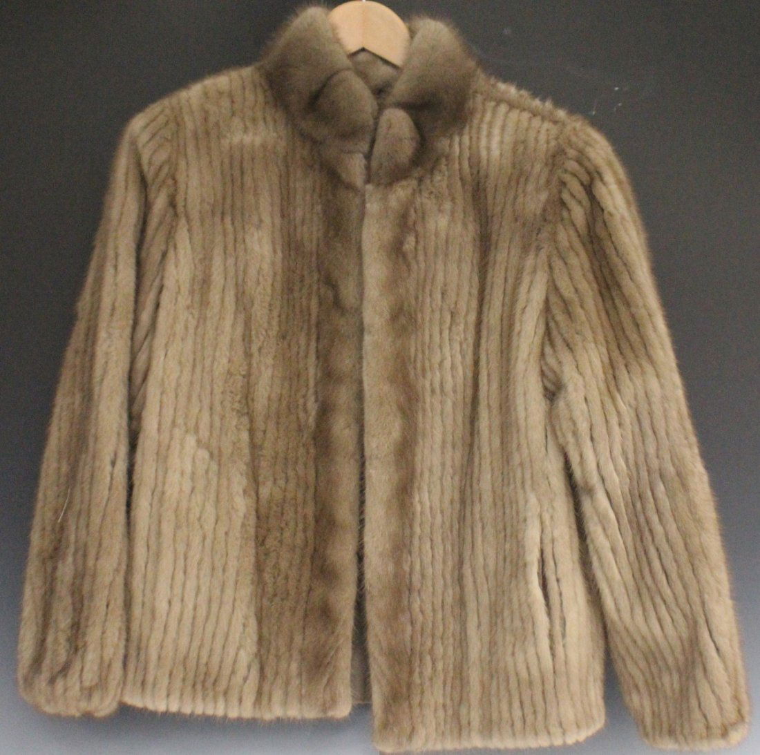 NATURAL PASTEL MINK FUR COAT SIZE SMALL: NATURAL PASTEL MINK FUR COAT Light brown half length mink fur coat, size small. Recently cleaned and glazed. Size: Neck to bottom 27", Shoulder to Shoulder 17", Shoulder to cuff 23".