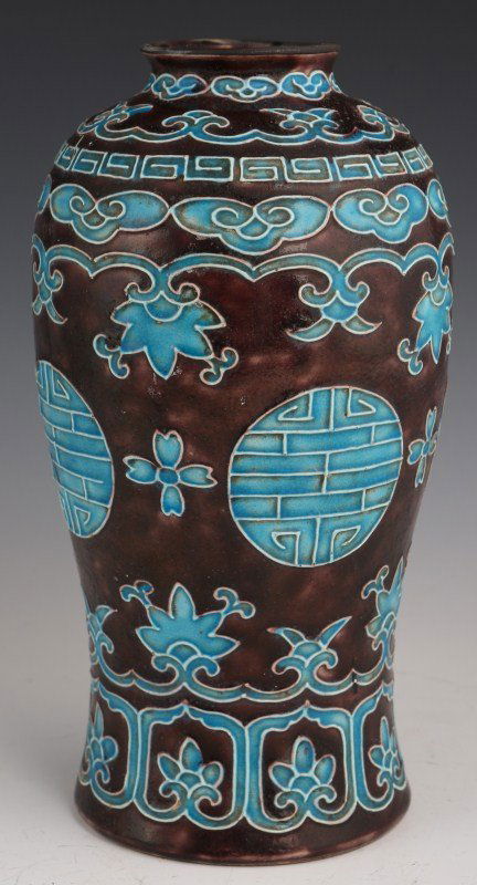 19TH CENTURY CHINESE EARTHENWARE VASE: 19TH CENTURY CHINESE EARTHENWARE VASE Chinese earthenware vase, purple and aqua glaze with white enamel accents. Floral design. Size: 10"
