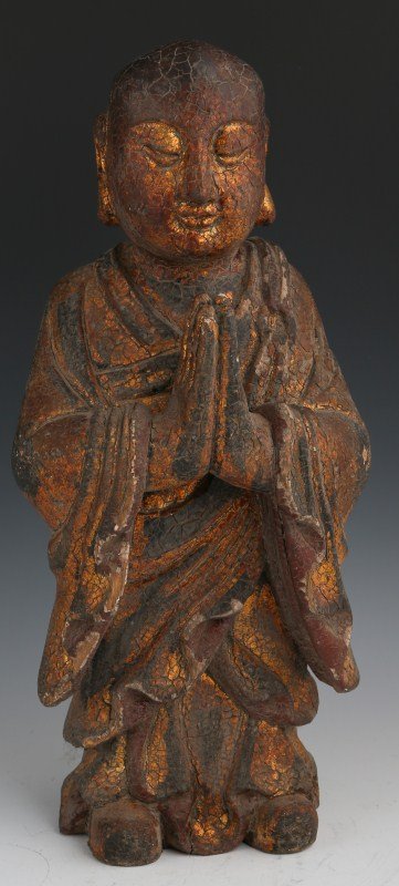 NEPALESE TEMPLE WOOD BUDDHIST MONK FIGURE: NEPALESE TEMPLE WOOD BUDDHIST MONK FIGURE Gilded wood Buddha or Buddhist monk figure. Size: 18"