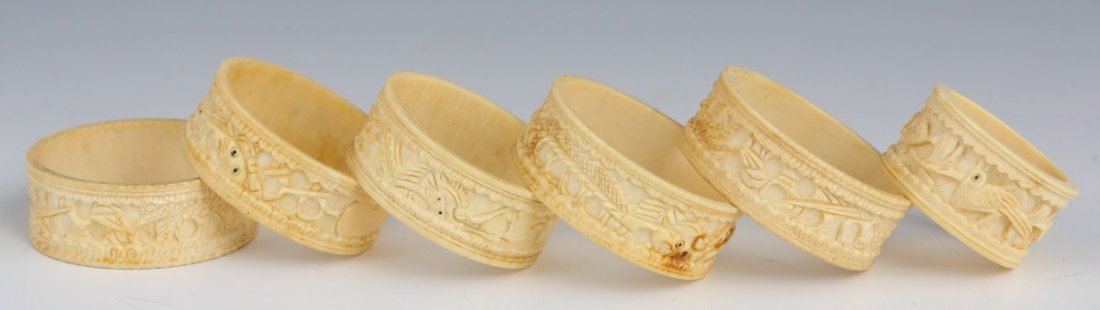 LOT OF SIX IVORY NAPKIN RINGS: LOT OF SIX IVORY NAPKIN RINGS All varying slightly in size. Each with carved design around it. **Please be advised: International shipping it NOT permitted on items containing Ivory** Thank you.
