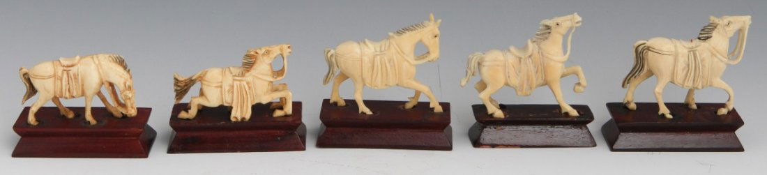 FIVE CARVED IVORY HORSE FIGURES: FIVE CARVED IVORY HORSE FIGURES Five carved ivory horse figures in various actions: one galloping, two in mid canter with raised heads, one in mid canter with lowered head and one grazing figure. All
