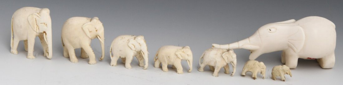 LOT OF GRADUATED CARVED IVORY ELEPHANT FIGURES: LOT OF GRADUATED CARVED IVORY ELEPHANT FIGURES A lot of eight carved ivory elephant figures, graduated in size. All eight elephant figures are depicted with their trunks hanging towards the ground in 