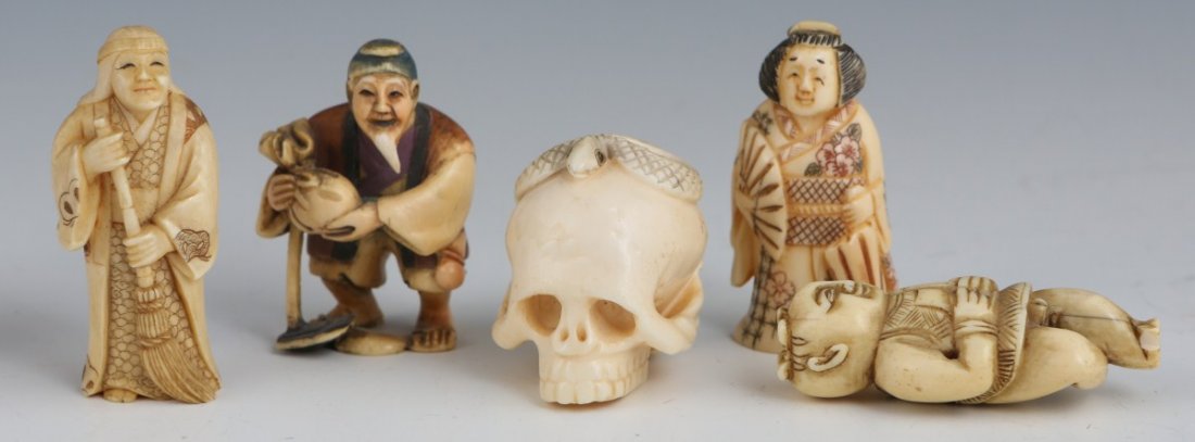 LOT OF 5 ASSORTED CARVED SIGNED IVORY NETSUKE: LOT OF 5 ASSORTED CARVED SIGNED IVORY NETSUKE Lot of 5 assorted hand-carved ivory netsuke to include: a polychrome stained lady with fan, a polychrome stained male peasant, a stained female with broom