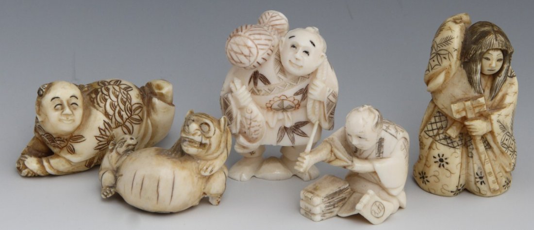 LOT OF 5 JAPANESE CARVED IVORY NETSUKES: LOT OF 5 JAPANESE CARVED IVORY NETSUKES Three have minor damage. The five come from a variety of ivory's. Size: up to 2" **Please be advised: International shipping it NOT permitted on items containin