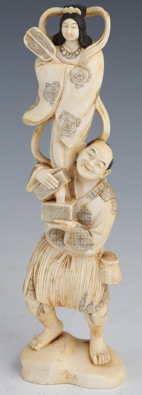 CHINESE CARVED IVORY FIGURE OF A MAN: CHINESE CARVED IVORY FIGURE OF A MAN Carve figure of a man with a box and genie type apparition appearing above him. Signed. Size: 7" tall **Please be advised: International shipping it NOT permitted 
