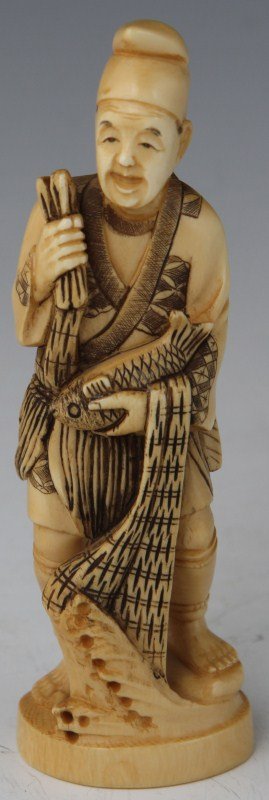 JAPANESE CARVED IVORY FISHERMAN OKIMONO SIGNED: JAPANESE CARVED IVORY FISHERMAN OKIMONO SIGNED A Japanese carved ivory okimono featuring a capped fisherman cradling a flipped fish in one arm, over which his net is draped. His opposite hand holds th