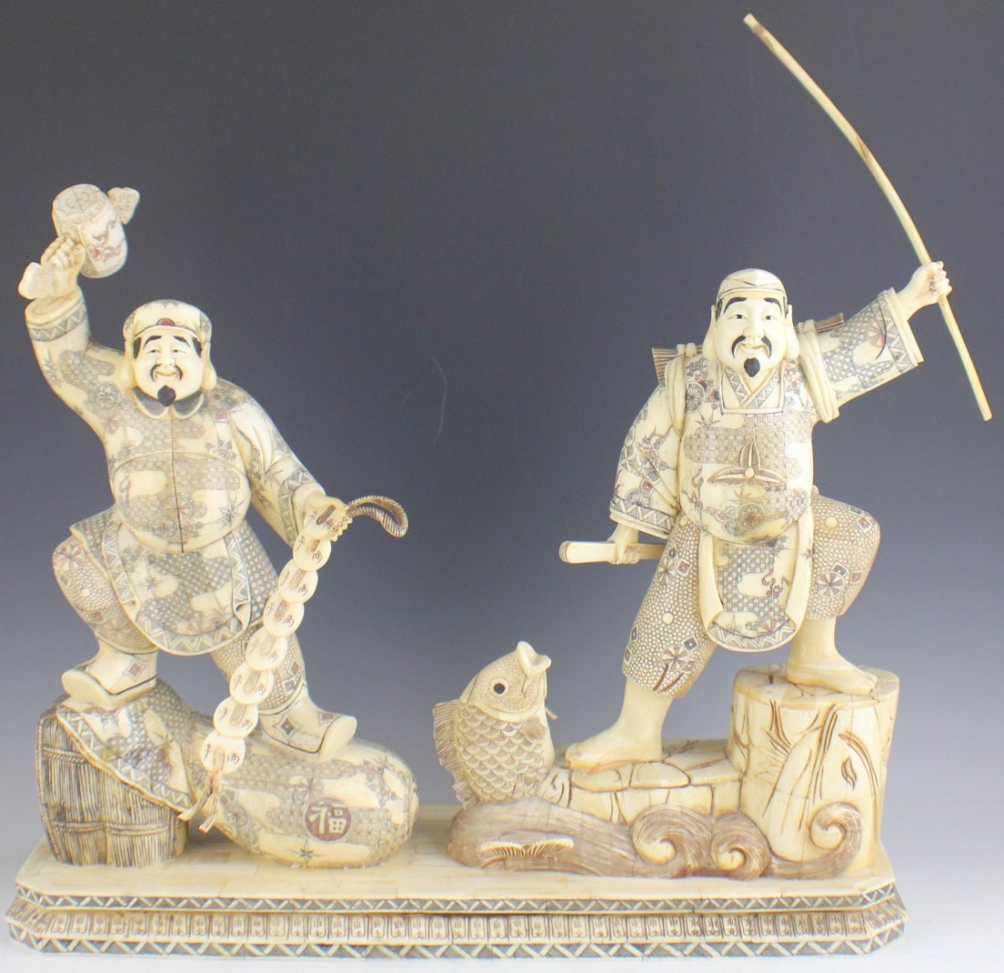 CHINESE BONE OVERLAY FIGURE FISHERMAN & HOTEI: CHINESE BONE OVERLAY FIGURE FISHERMAN & HOTEI Large carved Chinese bone overlay sculpture with two figures, one fisherman with fishing pole and fish; one Hotei figure with hammer, bag of treasure, and