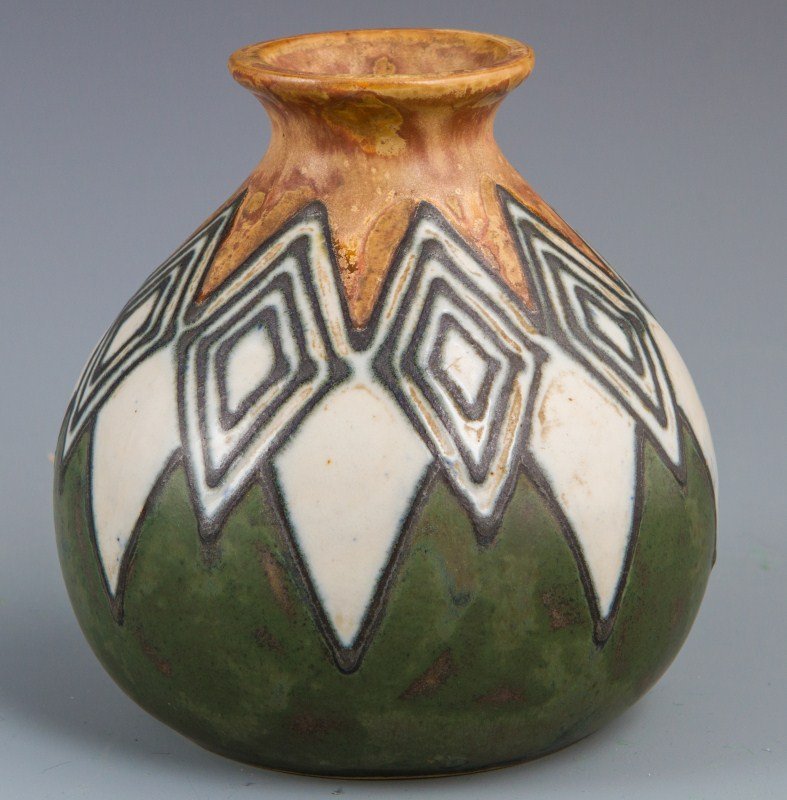 QUIMPER ODETTA ART DECO VASE ENAMEL STONEWARE: QUIMPER ODETTA ART DECO VASE ENAMEL STONEWARE Quimper vase, bearing the Odetta mark (1922 - 1935) from the Grande Maison HB factory. Enamel decorated stoneware, design features diamond pattern. Bottom