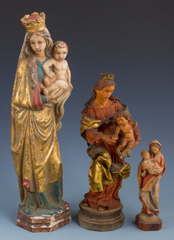 LOT OF THREE MADONNA AND CHILD WOODEN FIGURES: LOT OF THREE MADONNA AND CHILD WOODEN FIGURES Three carved wooden figures of Madonna carrying the Christ child. The largest of three is 15" and has a sticker on the bottom reads "Madonna and child aft