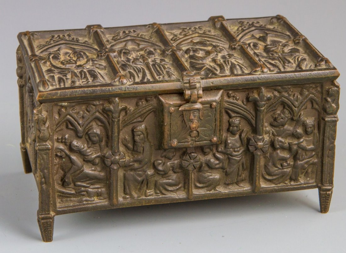 FRENCH CAST METAL BOX WITH RELIGIOUS MOTIF RELIEF: FRENCH CAST METAL BOX WITH RELIGIOUS MOTIF RELIEF A cast metal box with hinged lid, probably French. Top and sides feature religious imagery in relief. Bottom of the box is marked "Depose, 13524, L - 