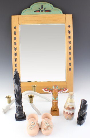 LOT OF NATIVE AMERICAN DECOR: LOT OF NATIVE AMERICAN DECOR Lot of Native American Decor to include; Resin Totem Pole with two seals and a frog, black in color, measures 10". Sand paining in a bottle, depicts moose and mountain sce
