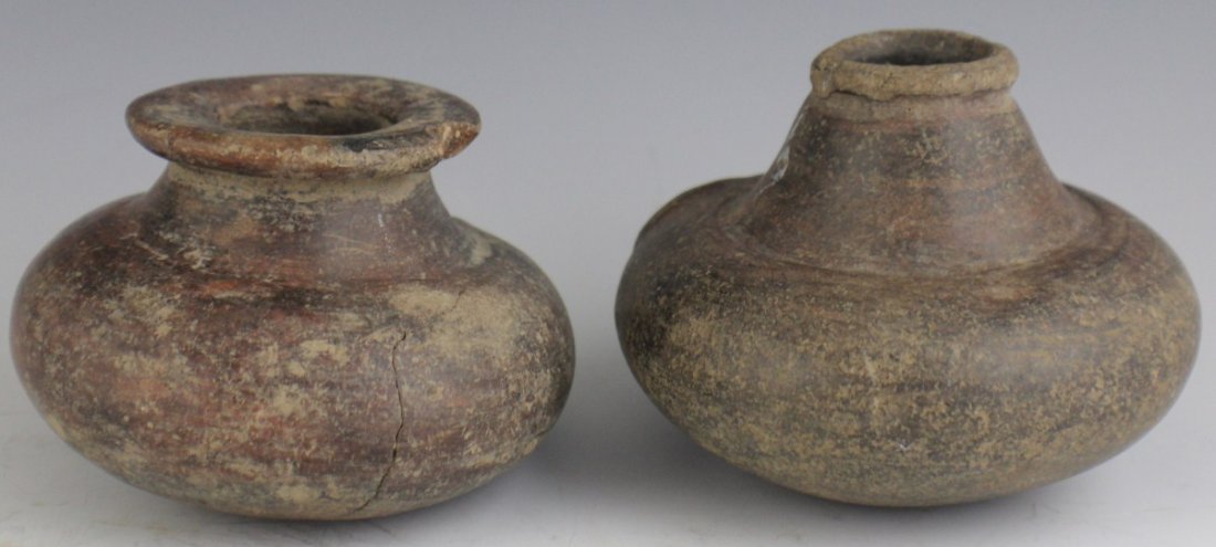 TWO SMALL PRE-COLOMBIAN CLAY POTS: TWO SMALL PRE-COLOMBIAN CLAY POTS Two small pre-Colombian pots. Overall good condition with some nicks and chips. Size: 3", 4"