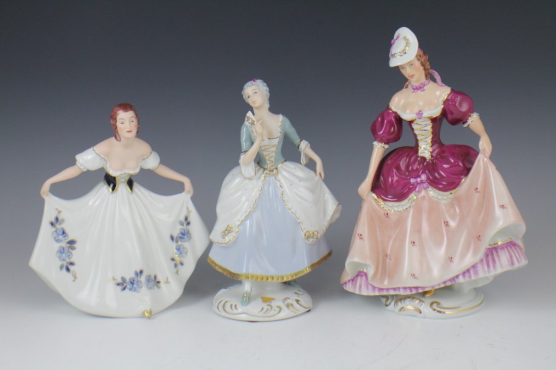 LOT OF THREE ROYAL DUX FEMALE FIGURES: LOT OF THREE ROYAL DUX FEMALE FIGURES Lot includes three Royal Dux Bohemia porcelain female figures. Size: 8 - 11"