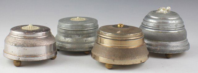 4 VINTAGE MUSICAL POWDER PUFF BOXES: 4 VINTAGE MUSICAL POWDER PUFF BOXES Lot of 4 musical powder puff boxes. 1 Lador music box and 3 from unknown makers. Damage to the ballerina on one box. Gold-colored box is tightly wound and not curre