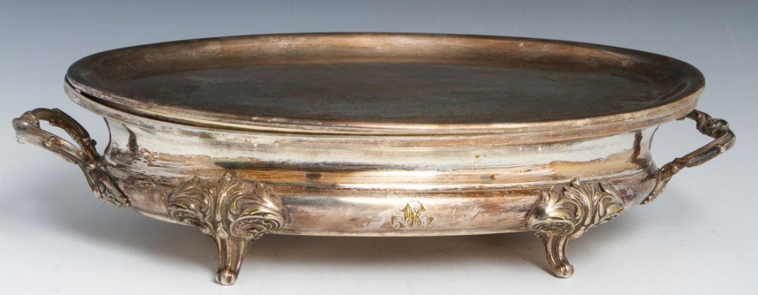CHRISTOFLE SILVER PLATED CHAFING TRAY: CHRISTOFLE SILVER PLATED CHAFING TRAY Christofle silver plated chafing tray; oval, two handles. Size: 18 x 10 x 4.5"