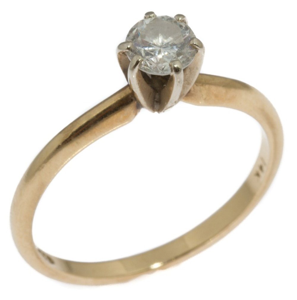 LADIES 14K GOLD DIAMOND SOLITAIRE ENGAGEMENT RING: LADIES 14K GOLD DIAMOND SOLITAIRE ENGAGEMENT RING Ladies solitaire engagement ring. Approximately a 0.4 ct round cut diamond of SI clarity and H-J color. 14K yellow gold band with white gold prongs. W