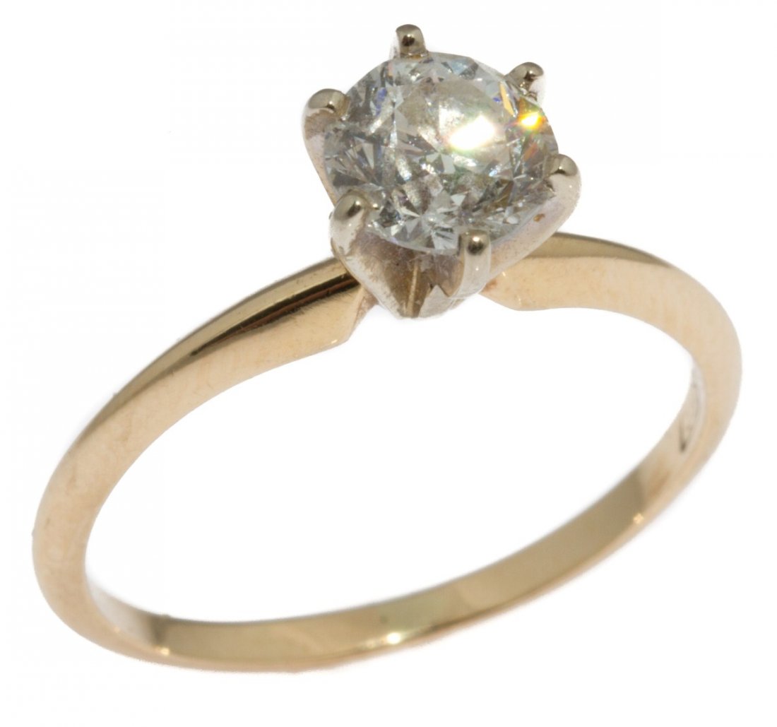LADIES 14K GOLD DIAMOND SOLITAIRE ENGAGEMENT RING: LADIES 14K GOLD DIAMOND SOLITAIRE ENGAGEMENT RING Round cut diamond in 14K yellow gold solitaire setting. Diamond is 1 ct, VS-2 clarity, and G color. With GIA diamond report number 2063778, dated May 