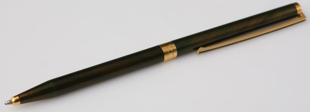 S T DUPONT LAQUE DE CHINE BALLPOINT PEN: S T DUPONT LAQUE DE CHINE BALLPOINT PEN Iridescent greenish brown with gold streak Dupont ballpoint. Gold colored accents at tips and joint, blue ink, case numbered A1JJ98. Size: 5.5"