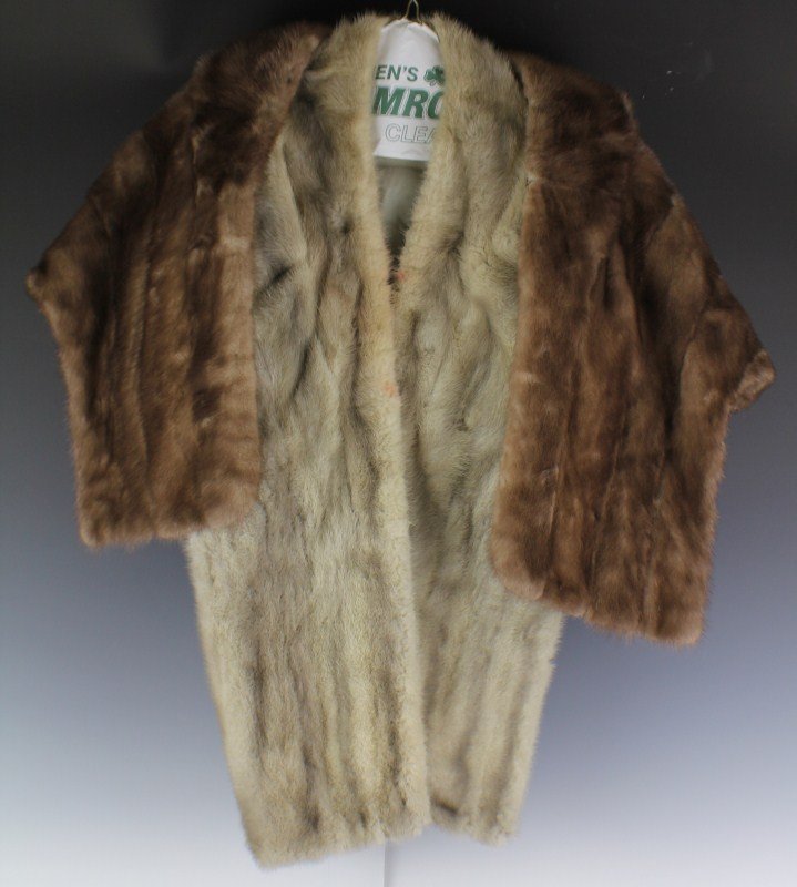 2 MINK FUR STOLES: 2 MINK FUR STOLES Smaller dark brown by Lutetia 21" inside bottom to neck 16" shoulder to shoulder "LRW". White-ish gray stole is 29" inside bottom to neck, 16" should to shoulder. "Anne Bernstein".