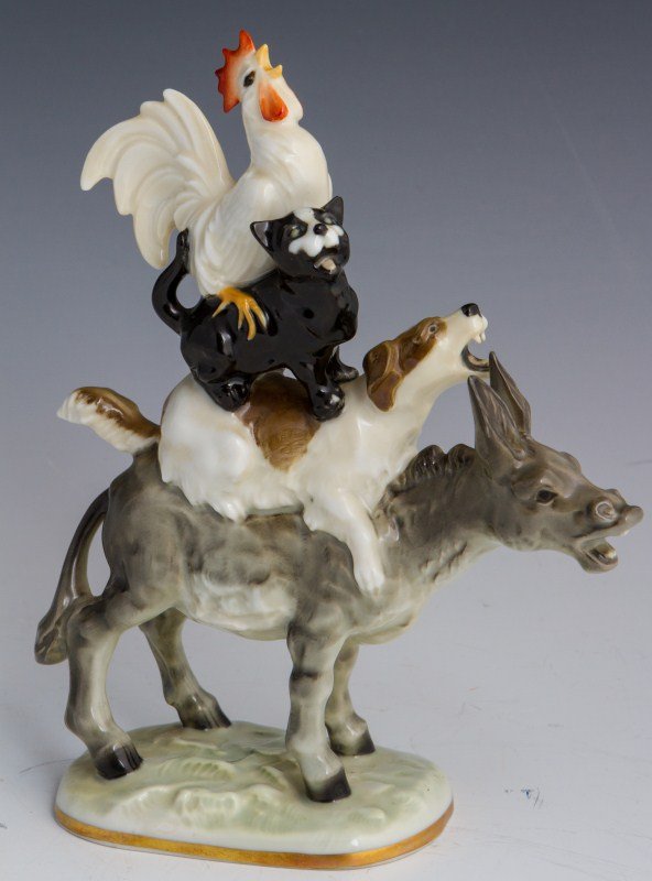 HUTSCHENREUTHER SELB PORCELAIN FIGURE OF ANIMALS: HUTSCHENREUTHER SELB PORCELAIN FIGURE OF ANIMALS Stacked donkey, dog, cat and chicken. Size: 7.5"