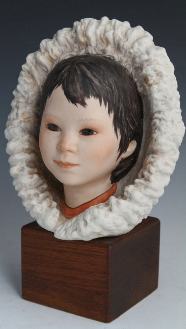 CYBIS PORCELAIN ESKIMO HEAD BUST: CYBIS PORCELAIN ESKIMO HEAD BUST Cybis Porcelain "Eskimo Head" Bust, sits on a fitted wooden base, signed Cybis Size: 11"