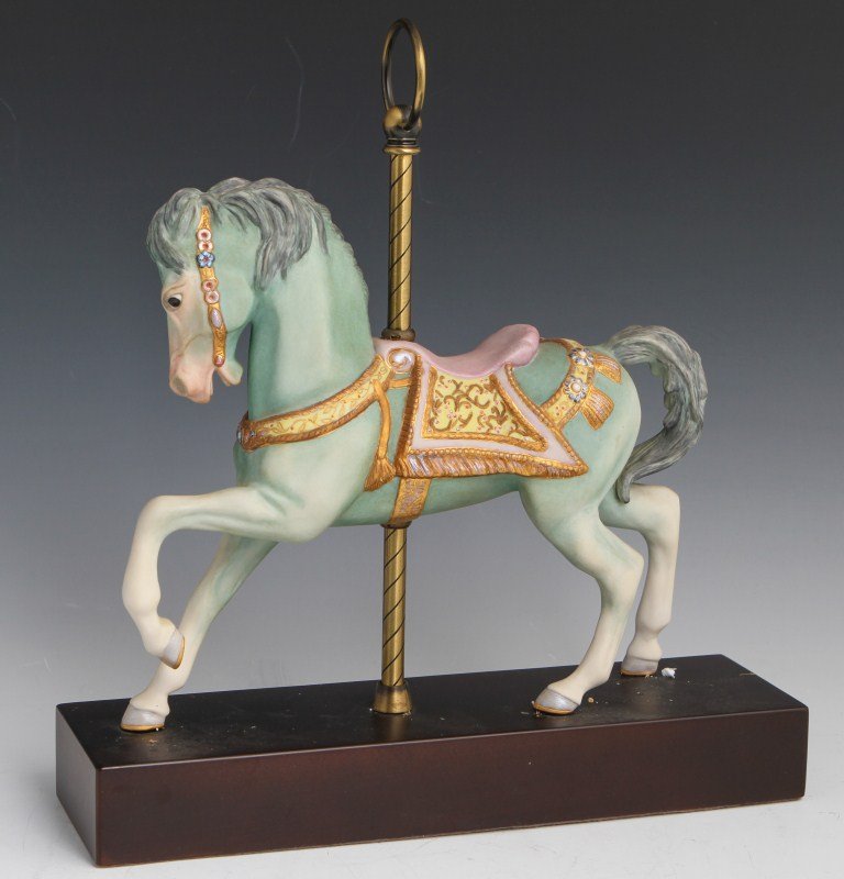 CYBIS PORCELAIN CAROUSEL HORSE #204: CYBIS PORCELAIN CAROUSEL HORSE #204 Porcelain carousel horse figurine by Cybis, with green hue and lavender and gold details. Size: 12" by 13"