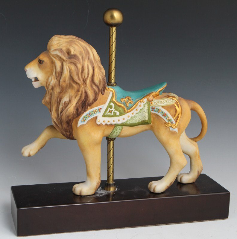 CYBIS PORCELAIN CAROUSEL LION #36: CYBIS PORCELAIN CAROUSEL LION #36 Porcelain carousel lion figurine by Cybis with naturalistic coloring and gold details on its colorful saddle. Size: 12" by 12"