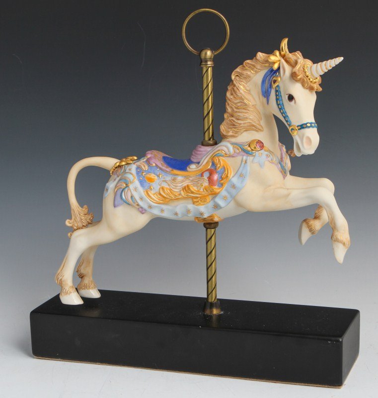 CYBIS PORCELAIN CAROUSEL UNICORN #134: CYBIS PORCELAIN CAROUSEL UNICORN #134 Porcelain carousel unicorn figurine by Cybis with celestial motif on the saddle. Size: 12" by 13"