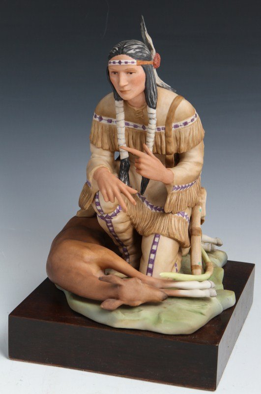 CYBIS NATIVE AMERICAN HUNTER PORCELAIN FIGURE: CYBIS NATIVE AMERICAN HUNTER PORCELAIN FIGURE Porcelain figurine by Cybis. Native American, #59. Signed and numbered. Native American man kneeling over slain deer. Size: 12.5"