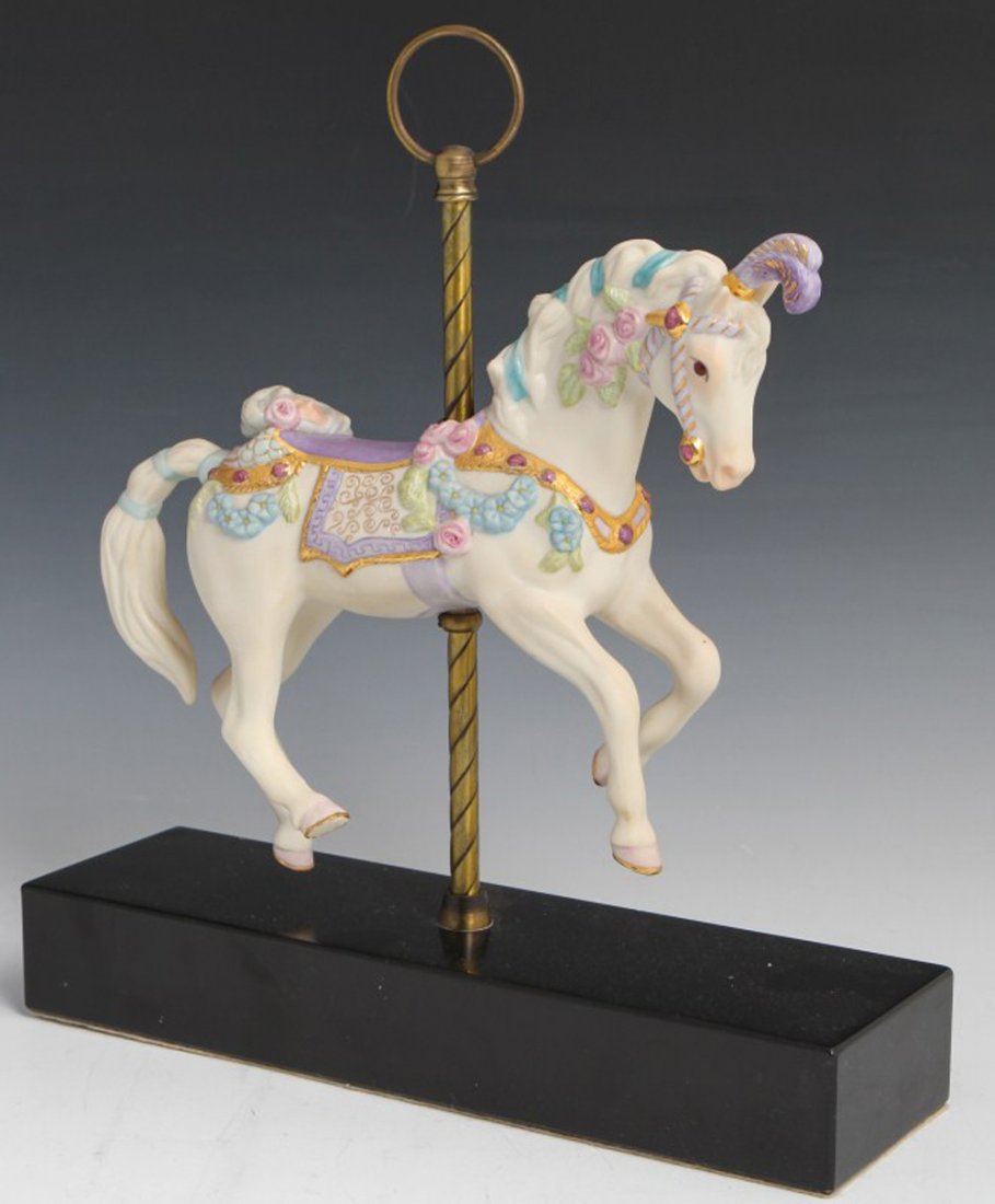 CYBIS PORCELAIN CAROUSEL HORSE FIGURE WITH STAND: CYBIS PORCELAIN CAROUSEL HORSE FIGURE WITH STAND Porcelain figure by Cybis, carousel horse with stand, #226. Signed and numbered. Size: 13.25"