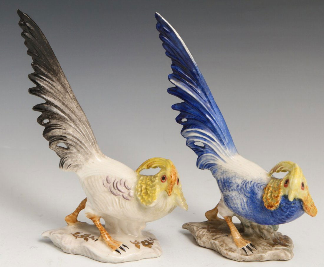 CYBIS PORCELAIN TWO BIRDS BLUE AND BLACK: CYBIS PORCELAIN TWO BIRDS BLUE AND BLACK Pair of porcelain birds by Cybis Porcelain. Gilt floral details. Signed on bottom,"M. B. Cybis." Size: 7"