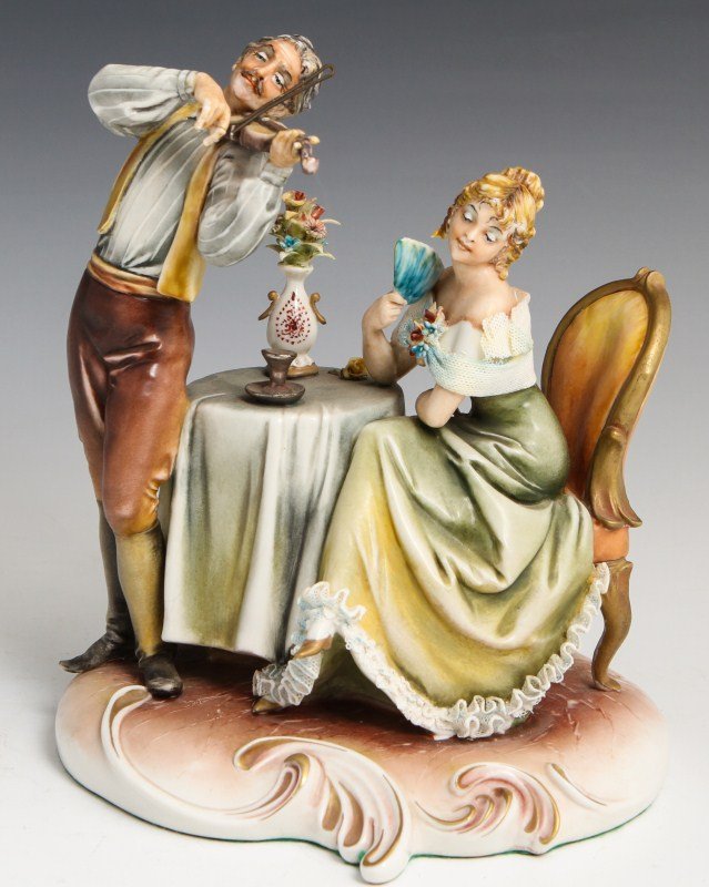 BORSATO PLAY GYPSY PLAY SIGNED PORCELAIN FIGURE: BORSATO PLAY GYPSY PLAY SIGNED PORCELAIN FIGURE Porcelain figure by Antonio Borsato, made in Italy. Play Gypsy Play, #771. Seated woman with fan listening to violin player. Figure is signed and stampe