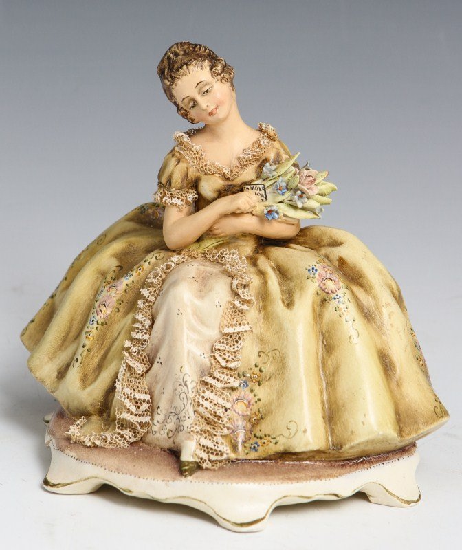 EARLY BORSATO YOUNG LADY SIGNED PORCELAIN FIGURE: EARLY BORSATO YOUNG LADY SIGNED PORCELAIN FIGURE Early Porcelain figure by Antonio Borsato, made in Italy. Young Lady, #233B. Young lady seated in formal dress with bouquet and small love note. Figure