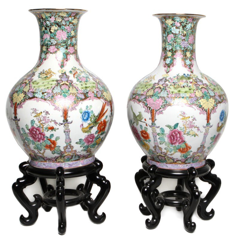 PAIR OF CHINESE POLYCHROME PORCELAIN FLOOR VASES: PAIR OF CHINESE POLYCHROME PORCELAIN FLOOR VASES Pair of Chinese porcelain floor vases depicting song birds and Asiatic pheasants within an ornate flower garden design. Palette of pinks, reds, yellow,