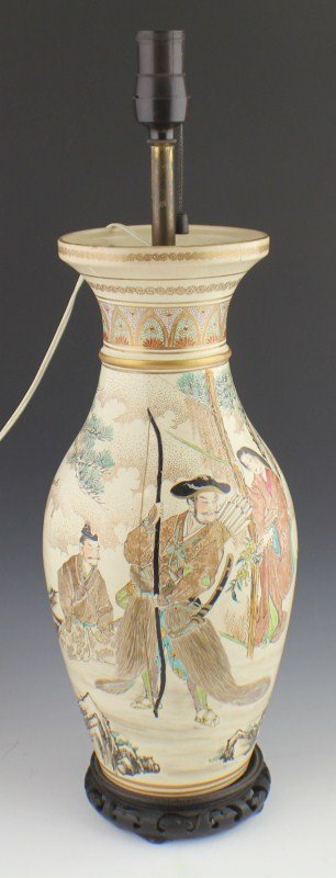 JAPANESE MEIJI PERIOD EARTHENWARE SATSUMA VASE: JAPANESE MEIJI PERIOD EARTHENWARE SATSUMA VASE Hand painted to show a scene of two Samurai warriors protecting a Samurai lady from Ronin (Samurai without a master). The vase has been converted to a la