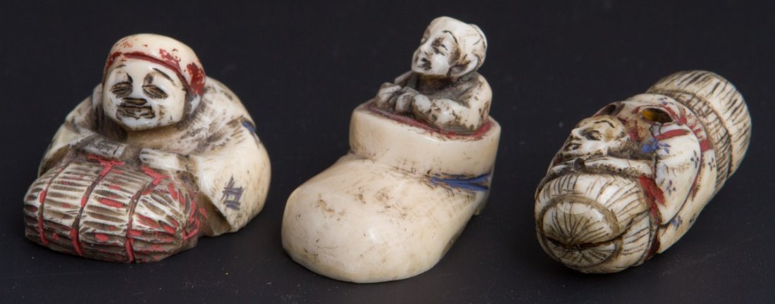 THREE POLYCHROME JAPANESE NETSUKE FIGURES: THREE POLYCHROME JAPANESE NETSUKE FIGURES Three Japanese carved ivory netsukes. Old man in shoe, man in bed, older man in boat. All polychrome. Size: 1 5/8"