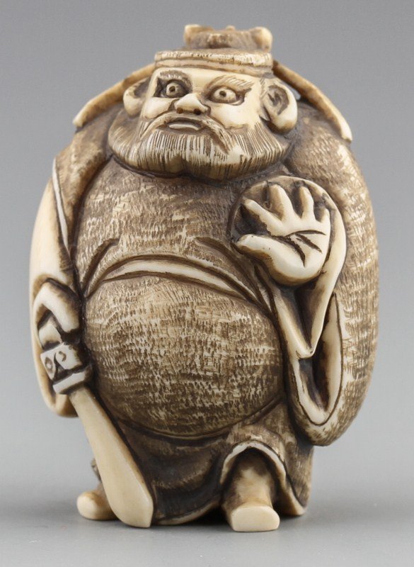JAPANESE CARVED IVORY NETSUKE BISHAMONTEN: JAPANESE CARVED IVORY NETSUKE BISHAMONTEN Japanese carved ivory netsuke figure of Bishamonten. Signature on bottom. Size: 2 x 1.5 x 1" Weight: 46.3g