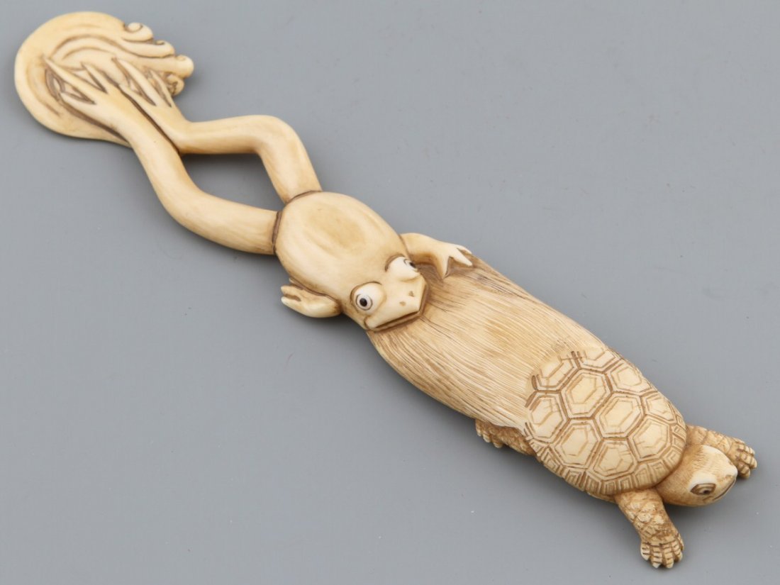 JAPANESE CARVED IVORY OKIMONO FROG/TORTOISE BAISHO: JAPANESE CARVED IVORY OKIMONO FROG/TORTOISE BAISHO Japanese carved ivory okimono of a tortoise and frog. Great detail on tortoise shell, Signed Baisho. Size: 6 1/2" Weight: 48.4 g