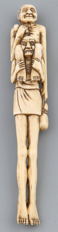 JAPANESE CARVED IVORY SASHI NETSUKE OF MAN & ELDER: JAPANESE CARVED IVORY SASHI NETSUKE OF MAN & ELDER Japanese carved ivory sashi netsuke of a man carrying his elder on his shoulders. Signed Baisho. Size: 7"l Weight: 58.8 g