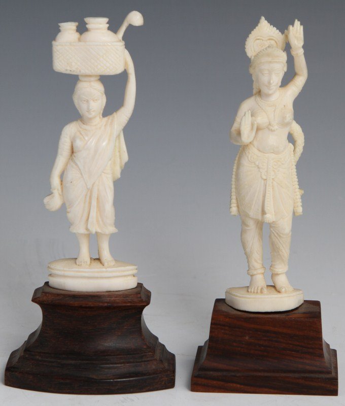 TWO INDIAN IVORY CARVED FEMALE FIGURES: TWO INDIAN IVORY CARVED FEMALE FIGURES Two Indian Ivory carved female figures, dancer and peasant. Both southeast depictions are very detailed and intricately carved, evident by the beads, folds, faci