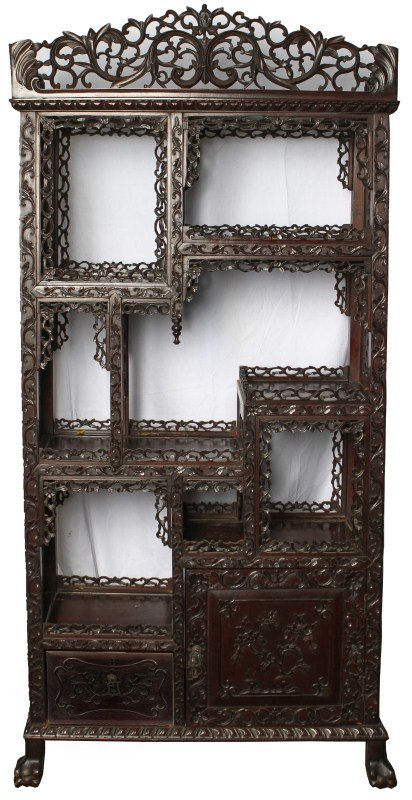 CARVED ASIAN ROSEWOOD MULTI TIERED SHELF: CARVED ASIAN ROSEWOOD MULTI TIERED SHELF Ornately carved multi-tier shelf, seven shelves in all with eight display openings; one cabinet. Crown, frames, and sides are carved out giving the piece a lac