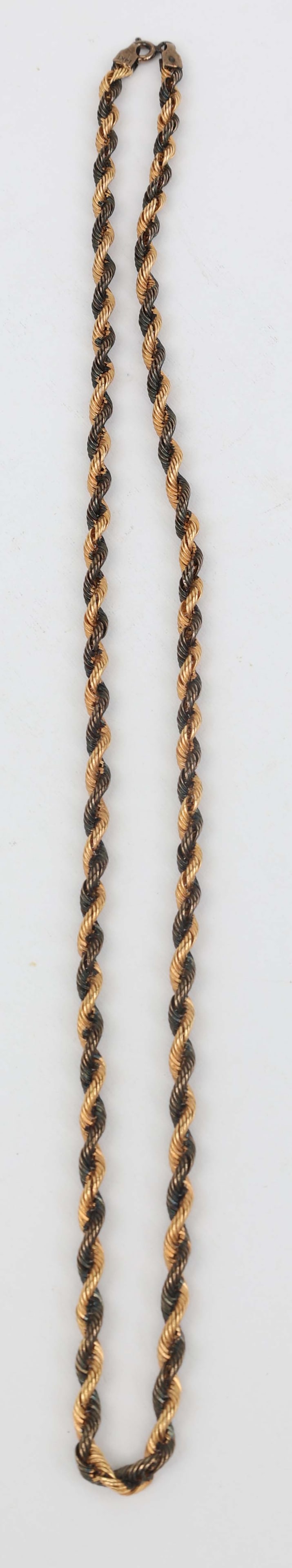 14K YELLOW GOLD & BLACK FINISH ROPE CHAIN: 14K yellow gold and black finish rope chain. 19" long 3.75 mm wide. 4.4 grams. Condition: Very Fine