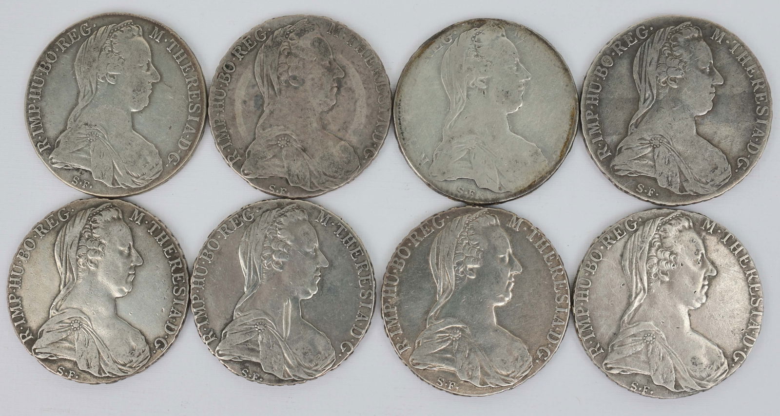 EIGHT MARIA THERESA THALER AUSTRIAN SILVER COINS (1 of 2)
